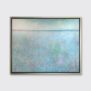 A blue abstract landscape print in a silver floater frame hangs on a white wall.