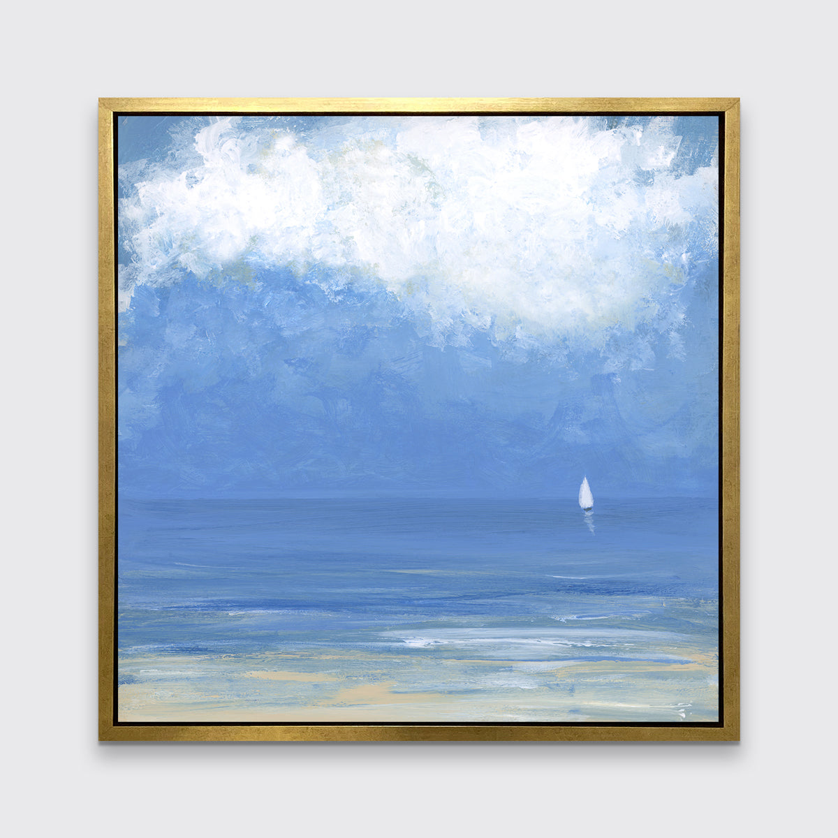 A blue, beige and white abstract seascape print with a small sailboat in a gold floater frame hangs on a white wall.