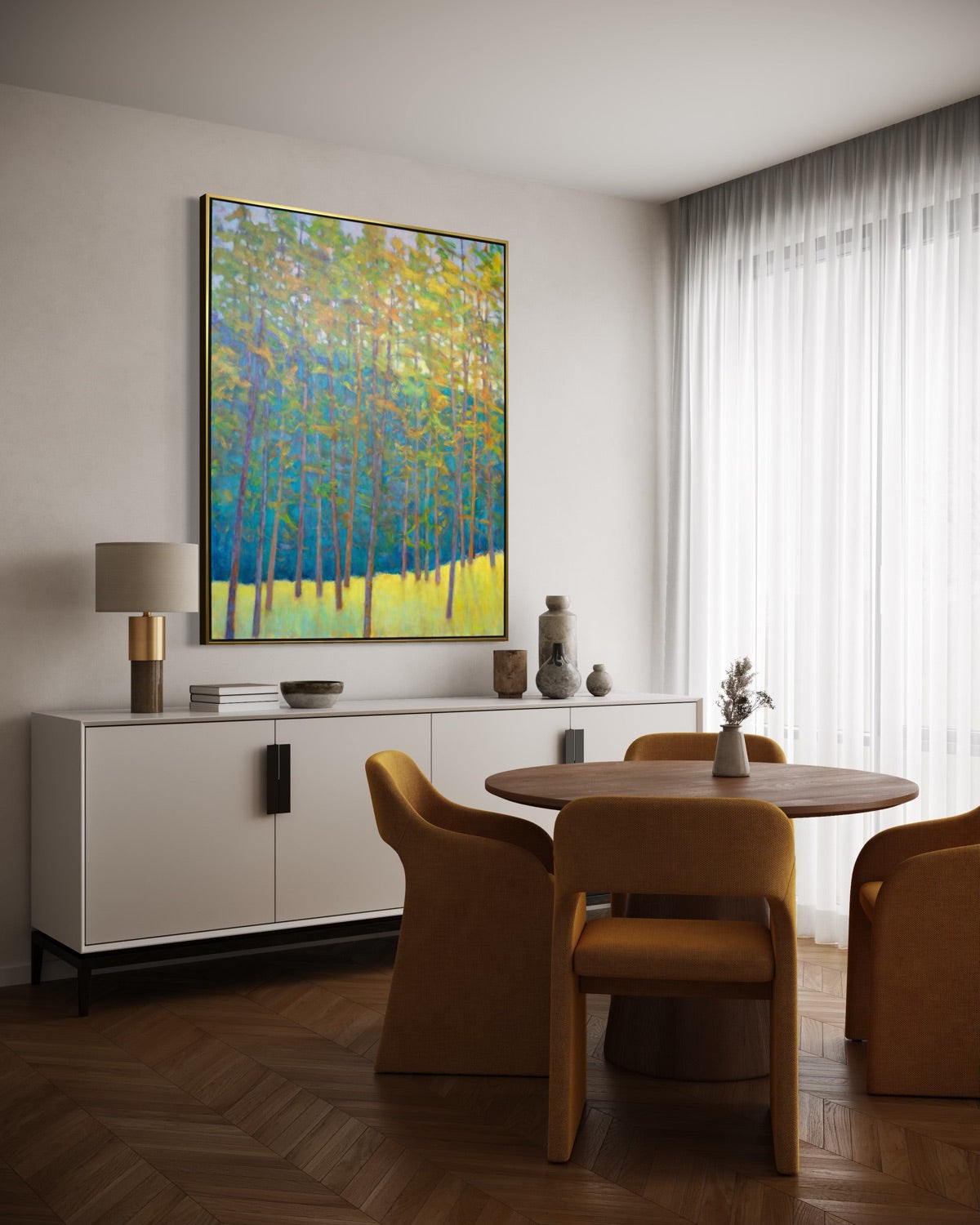 Modern dining room with a colorful abstract painting on the wall, a round wooden table, and chairs.