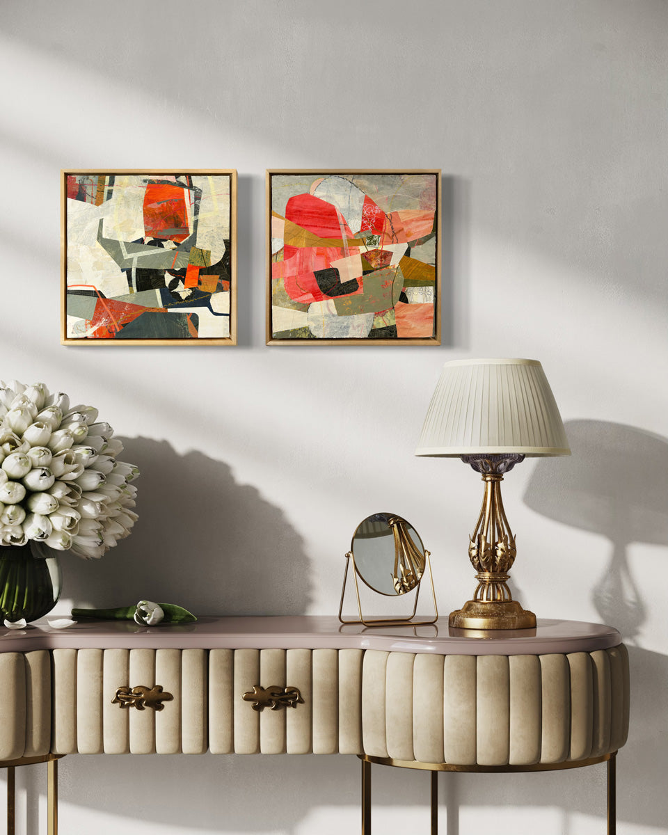 Two framed abstract collage artwork featuring geometric shapes in shades of red, beige, and green, with a white background hanging on a white wall.