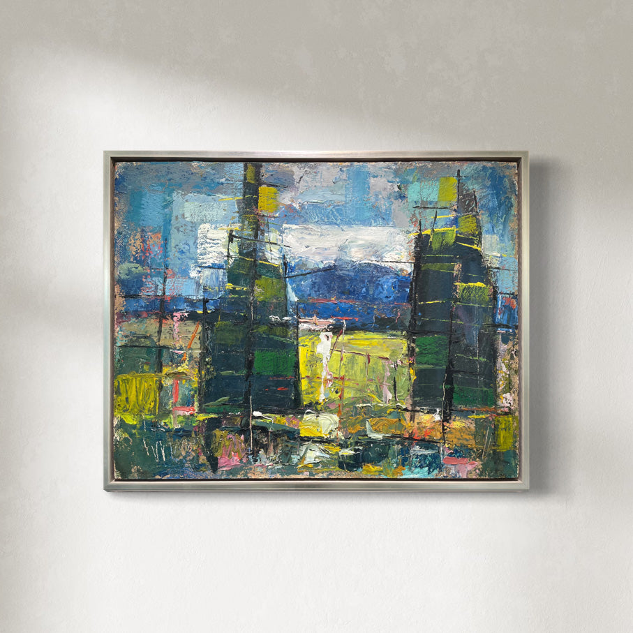 original abstract modern oil painting featuring a vibrant and colorful depiction of trees, framed in a light-colored enclosure.