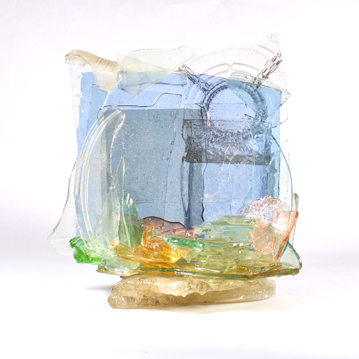 A glass sculpture on a white background.
