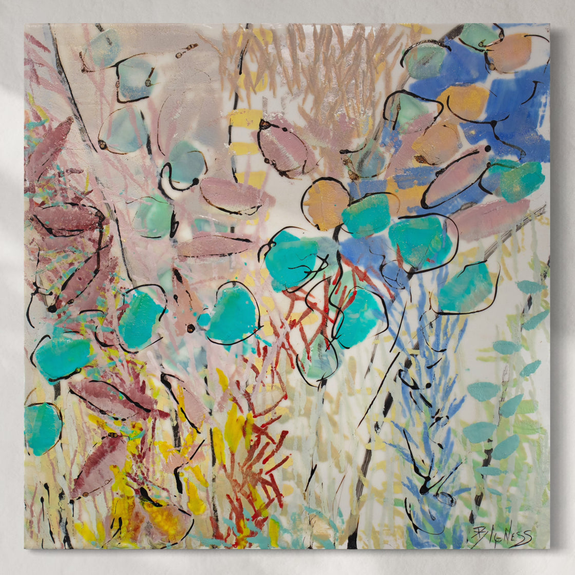 Original abstract artwork with colorful shapes on a gray background hanging on a white wall.