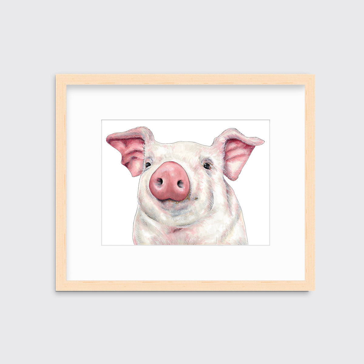 An illustration of a pig framed in a natural wood frame hangs on a white wall. 