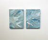 A video of a pair of thickly painted paintings in teal, sea foam green, celadon, white and hints of orange and yellow by Teodora Guererra.