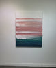 A video of a peach, coral, white and teal with lavender thick textured painting hanging on a white wall by Teodora Guererra.