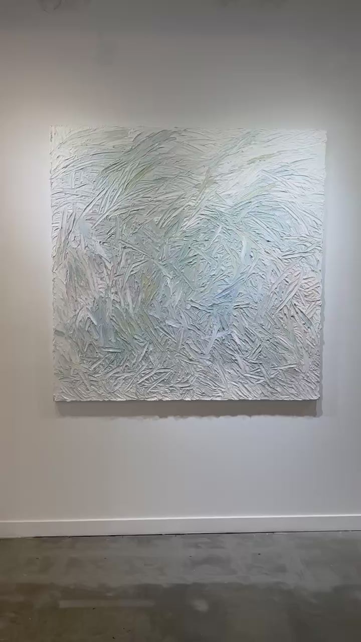 A video of an original abstract painting with thick texture by artist Teodora 'Teo' Guererra hanging on a white wall.