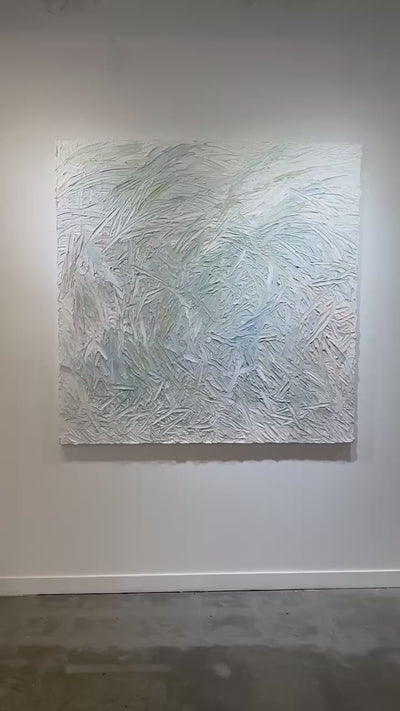 A video of an original abstract painting with thick texture by artist Teodora 'Teo' Guererra hanging on a white wall.