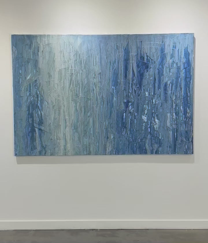 Video featuring an original abstract blue  and white drip painting by Teo Guererra on the wall.