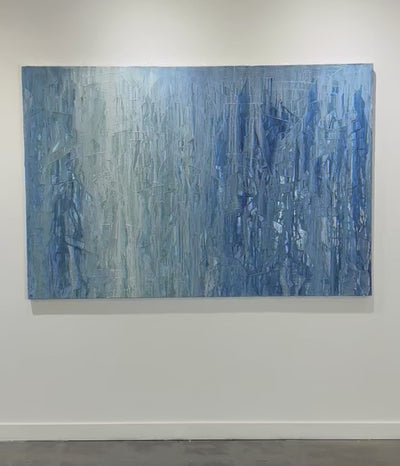Video featuring an original abstract blue  and white drip painting by Teo Guererra on the wall.