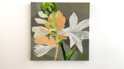 A video of an Abstract floral artwork with green, orange, and white flowers on a gray background hanging on a white wall.