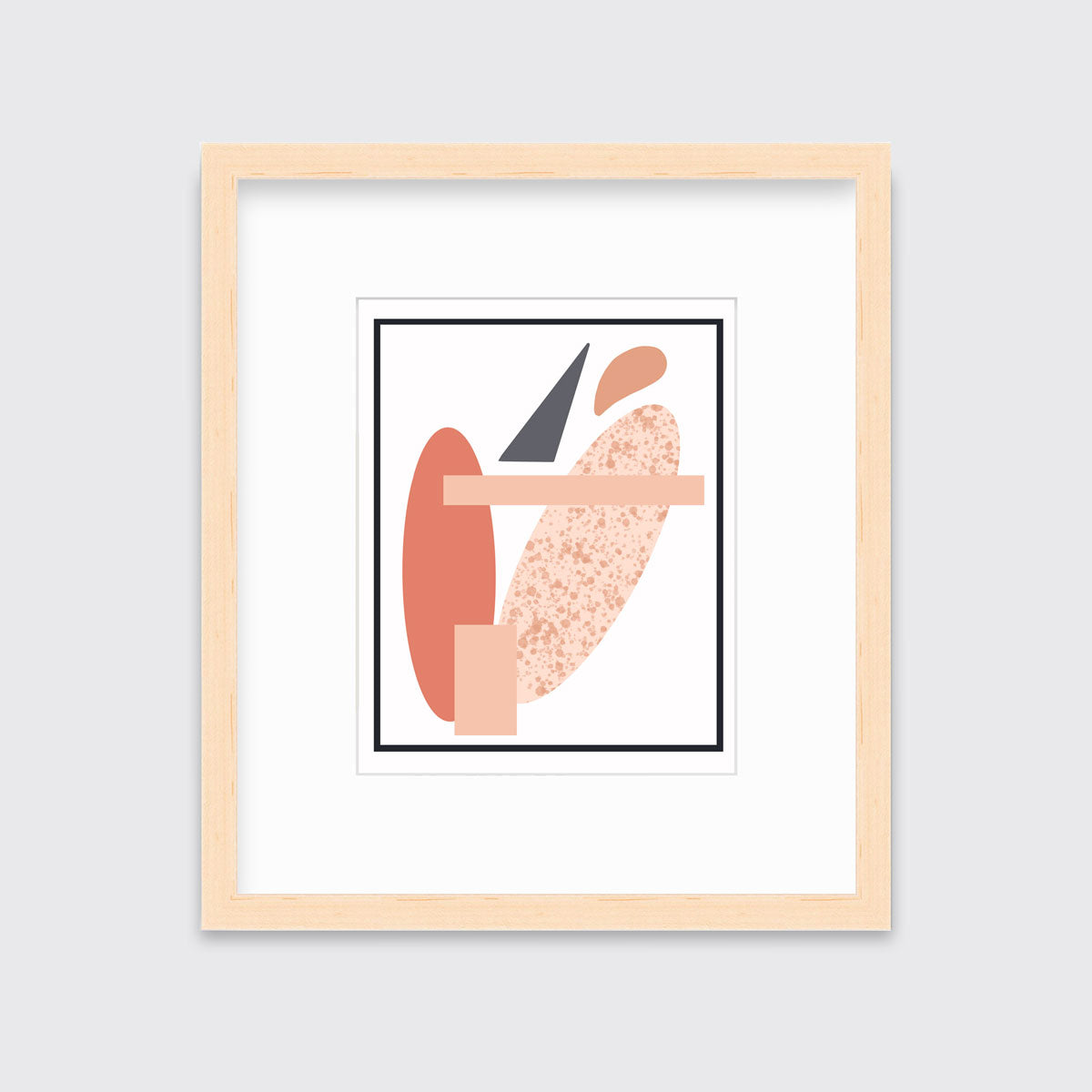 A pink and grey abstract art print framed in a neutral frame hangs on a light wall. 