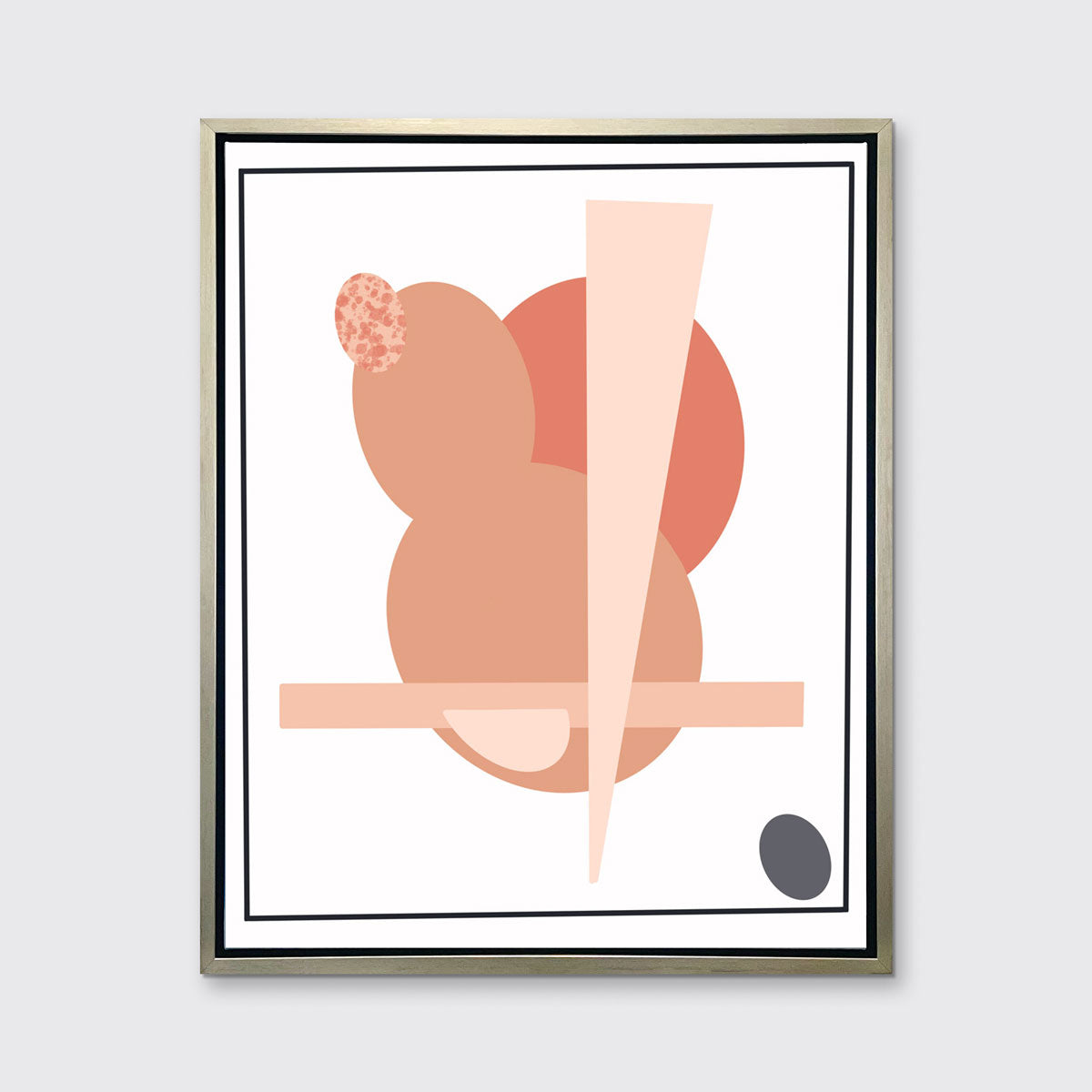A pink and grey abstract art print framed in a silver floater frame hangs on light wall.