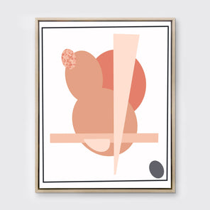 A pink and grey abstract art print framed in a neutral wood frame hangs on light wall.