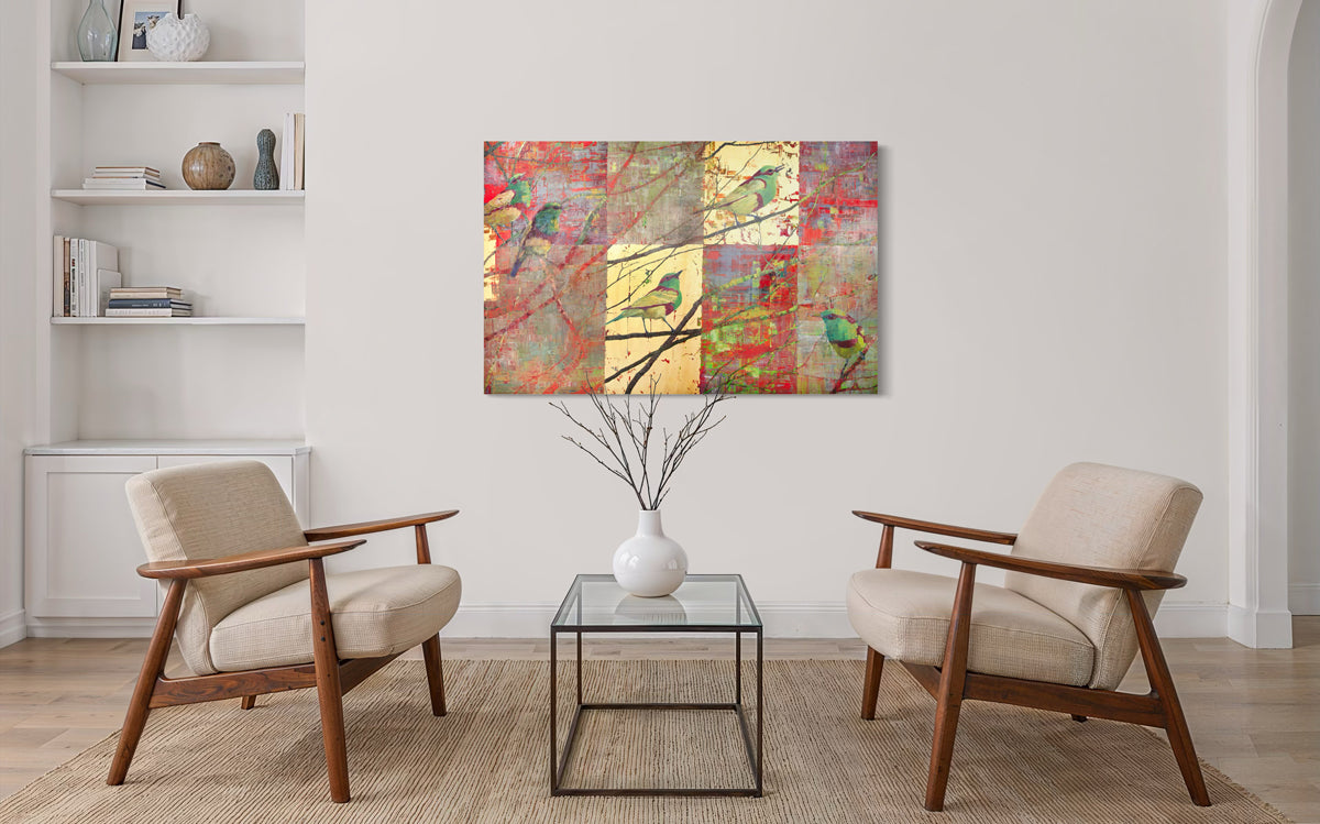 Living room with two armchairs and a coffee table, featuring a colorful abstract painting on the wall.