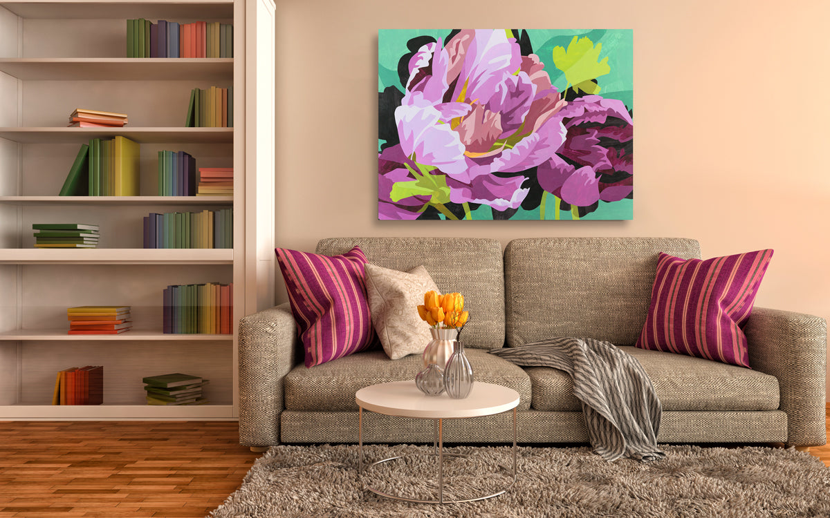 Living room with a gray sofa, colorful pillows, and a vibrant floral painting on the wall.