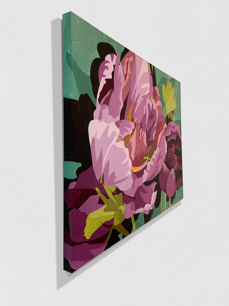 Floral painting with pink and purple flowers on a teal background hanging on a white wall, side view.