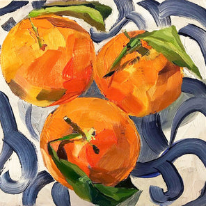 Three Clementines on Blue and White Plate