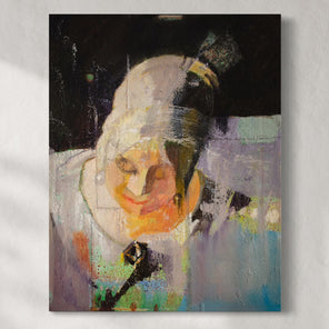 Original abstract painting of a person with colorful textures hanging on a white wall.