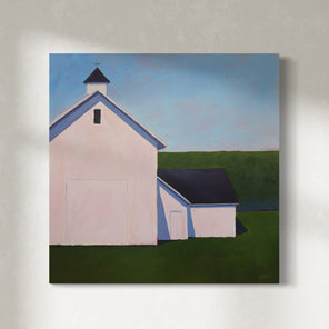 A painting of a white barn with a weather vane in front of a hedge is hung on a gallery wall.