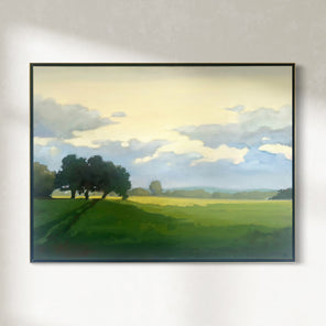Framed painting of a landscape with trees and a sky.
