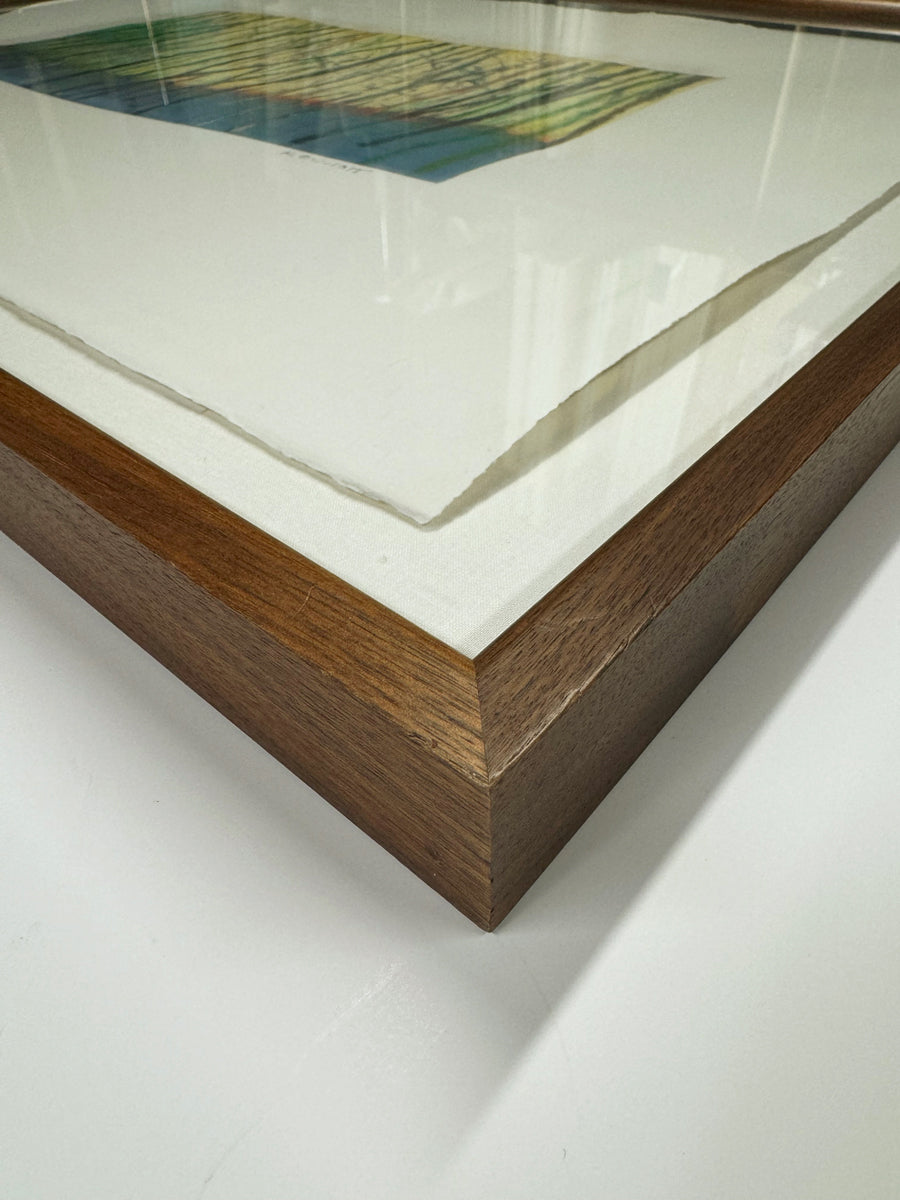 corner of a frame on a table.