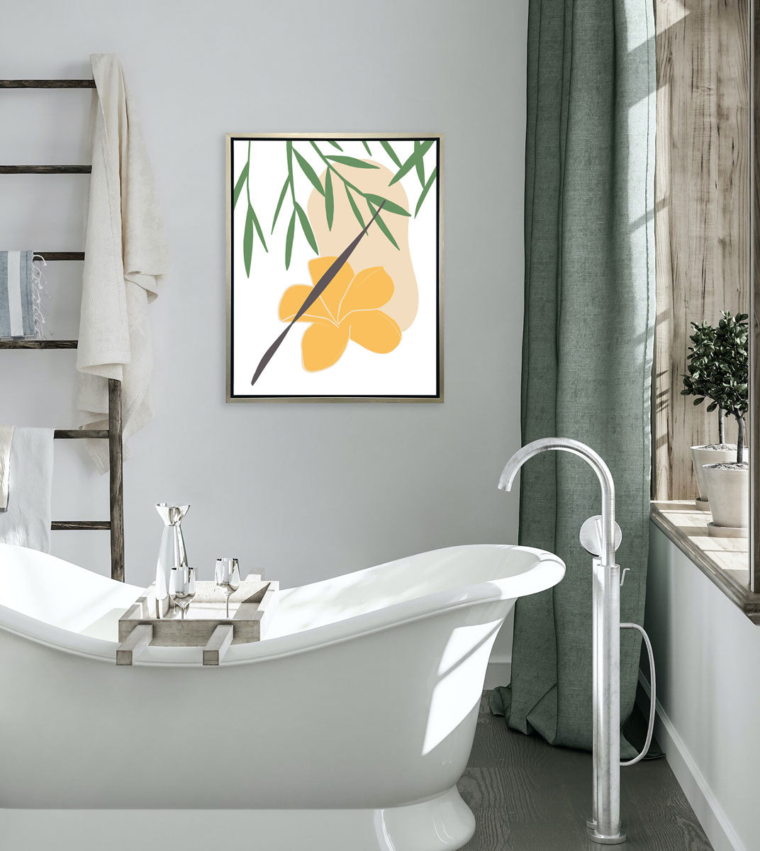 A green and yellow abstract botanical art print framed in a silver frame hangs on a wall above a modern bath tube and between a window and shelving unit with towels. 