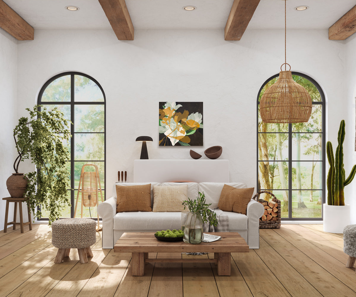 Modern living room with white sofa, wooden coffee table, and large windows.