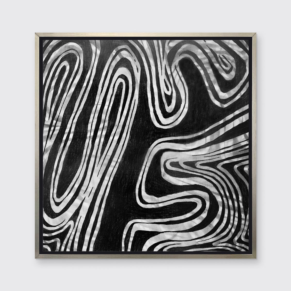 A black, grey and white abstract print in a silver floater frame hangs on white wall.