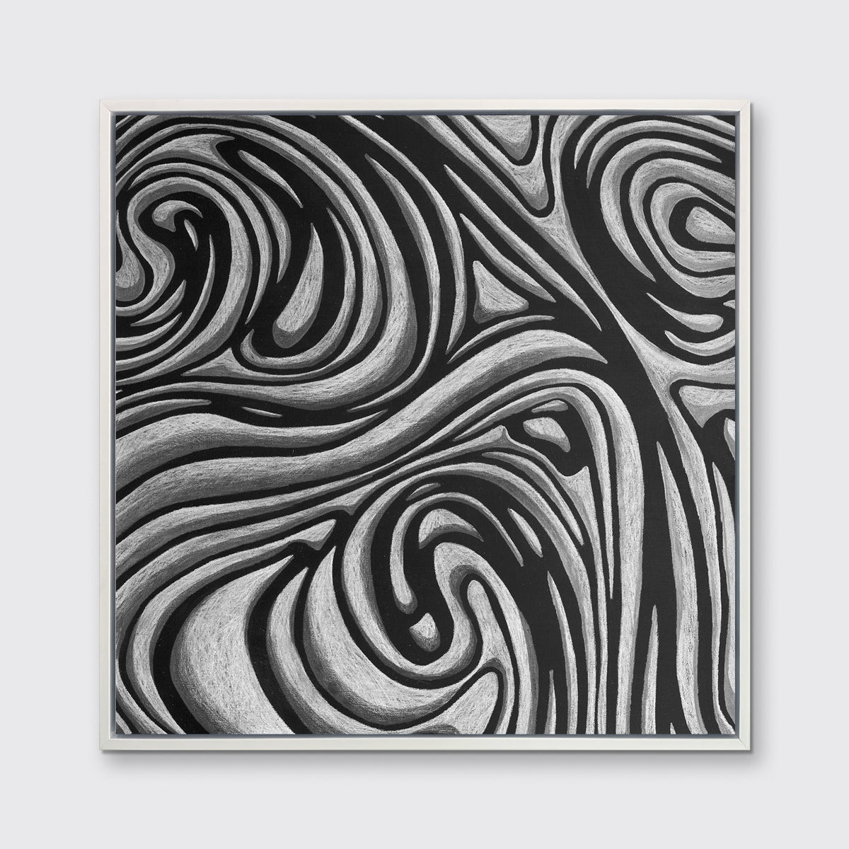 A black and grey abstract print in a white floater frame hangs on a white wall.