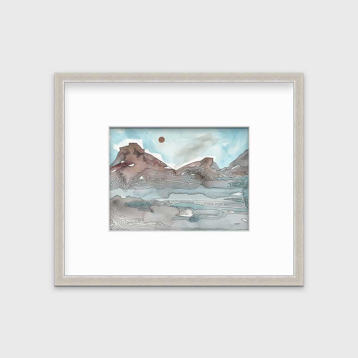 A light blue, brown and black abstract landscape illustration print in a silver frame with a mat hangs on a white wall.