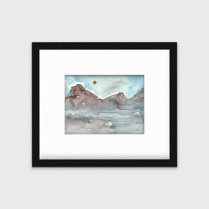 A light blue, brown and black abstract landscape illustration print in a black frame with a mat hangs on a white wall.