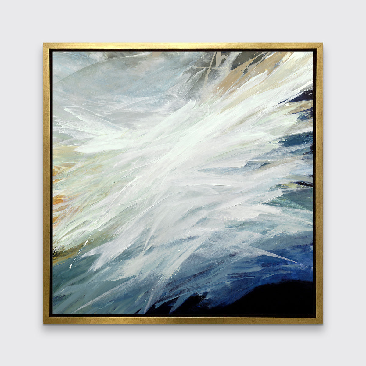 A blue, teal, beige and white abstract print in a gold floater frame hangs on a white wall.