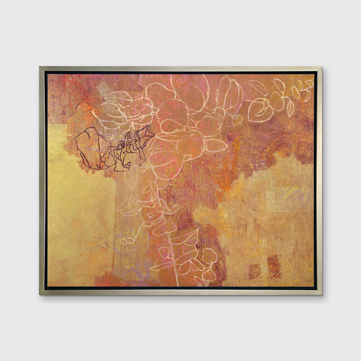 A gold, purple and white abstract print in a silver floater frame hangs on a white wall.