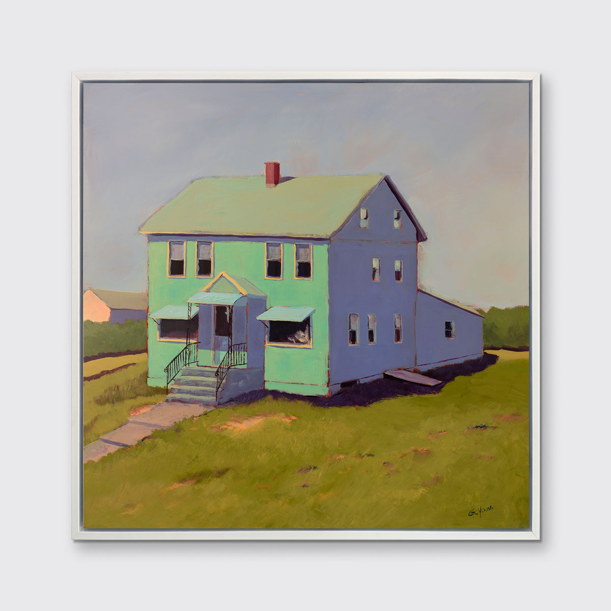 A seafoam green, blue and chartruse contemporary house print in a white floater frame hangs on a white wall.