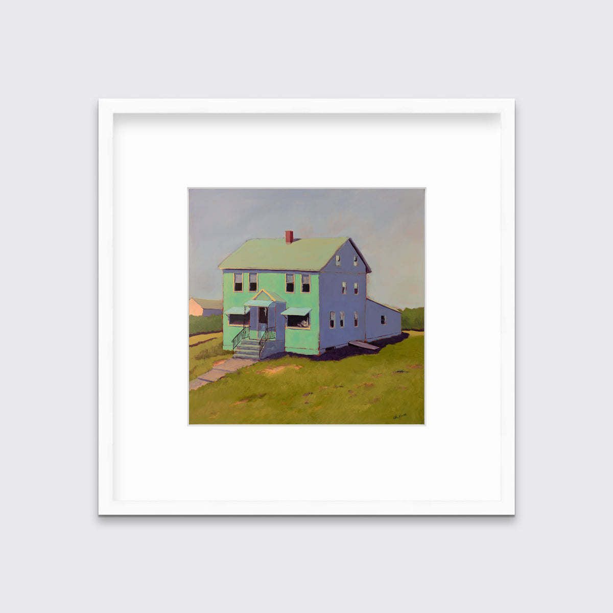 A seafoam green, blue and chartruse contemporary house print in a white frame with a mat hangs on a white wall.