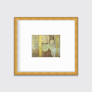 A gold, yellow, light green and light blue abstract in a gold frame with a mat hangs on a white wall.