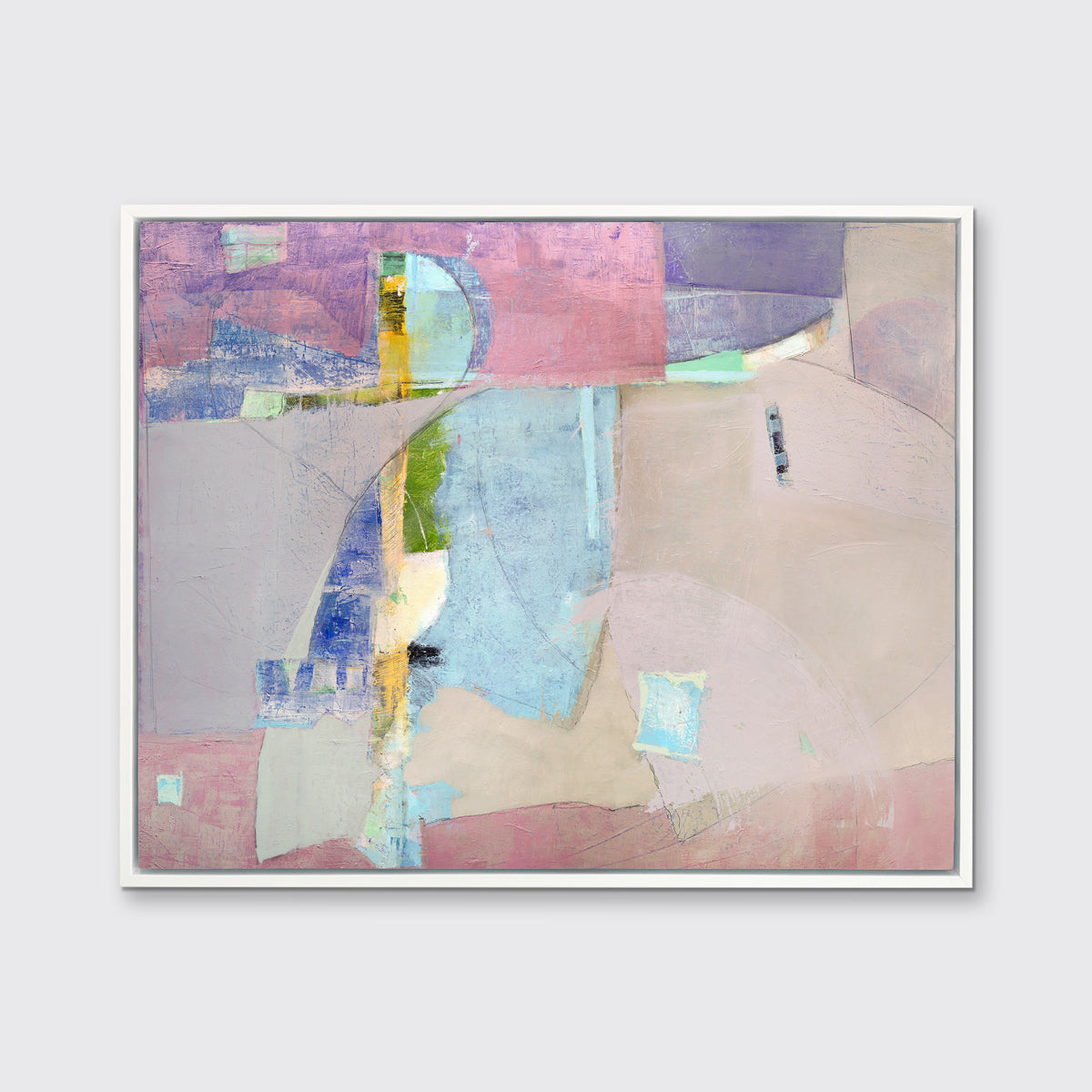 A pink, light blue, green and purple abstract print in a white floater frame hangs on a white wall.