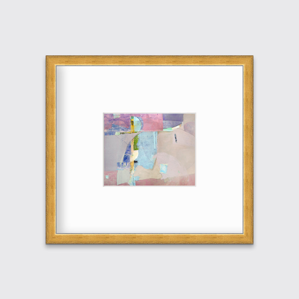 A pink, light blue, green and purple abstract print in a gold frame with a mat hangs on a white wall.