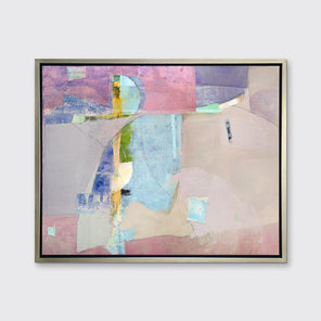 A pink, light blue, green and purple abstract print in a silver floater frame hangs on a white wall.