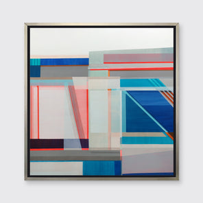 A blue, red, green and white geometric abstract print in a silver floater frame hangs on a white wall.