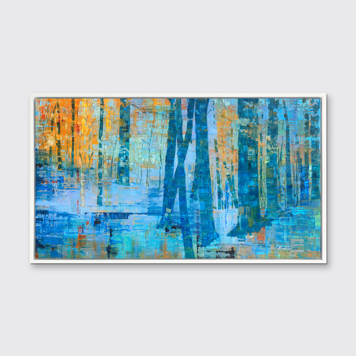 A blue, green and orange abstract tree landscape print in a white floater frame hangs on a white wall.
