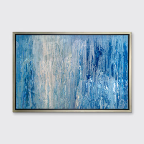 A blue, white and grey abstract print in a silver floater frame hangs on a white wall.