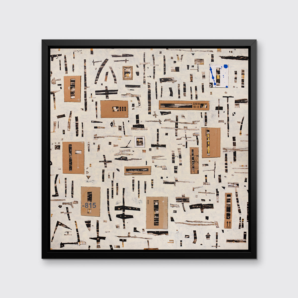 A brown and black abstract print in a black floater frame hangs on a white wall.