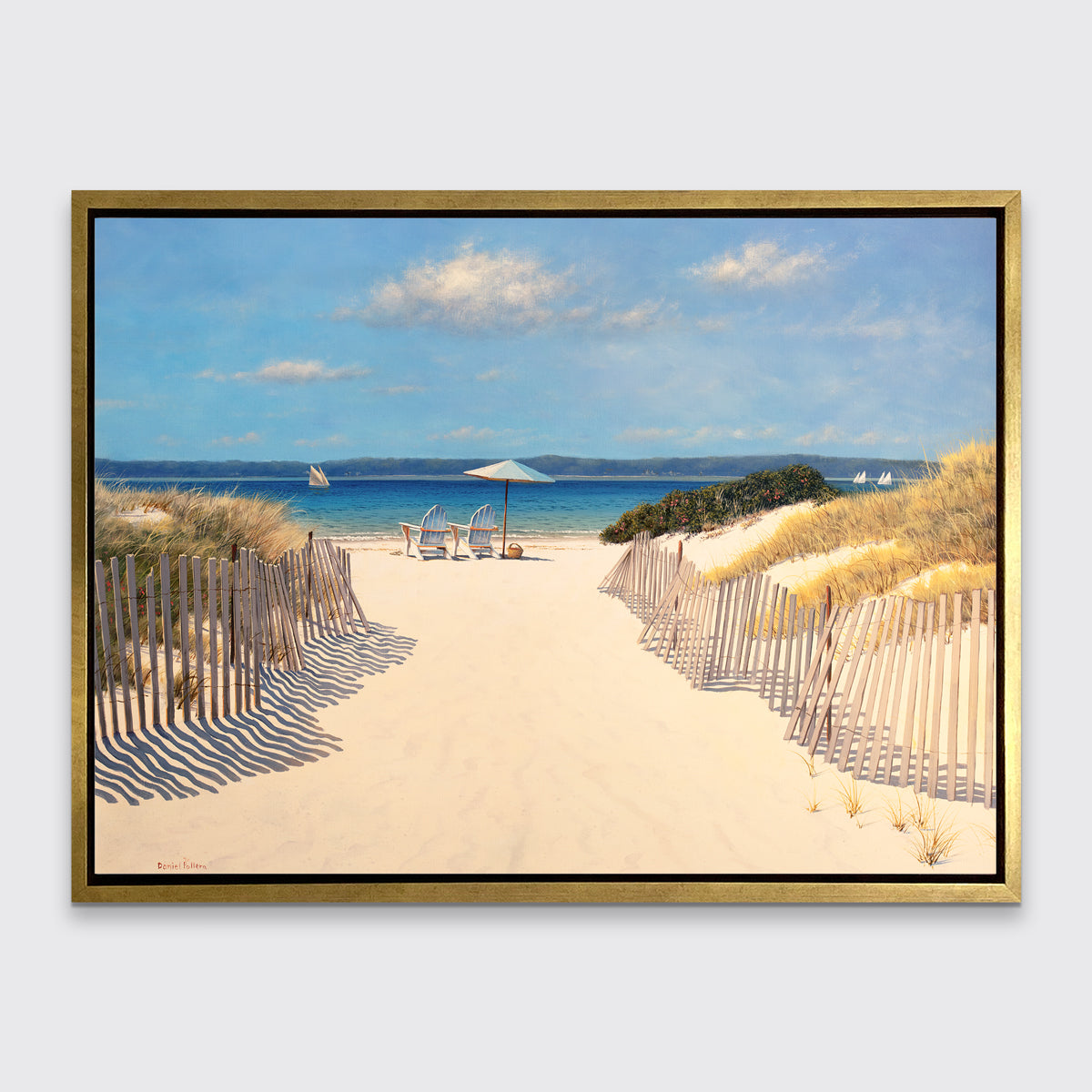 A realistic seascape print in a gold floater frame hangs on a white wall.