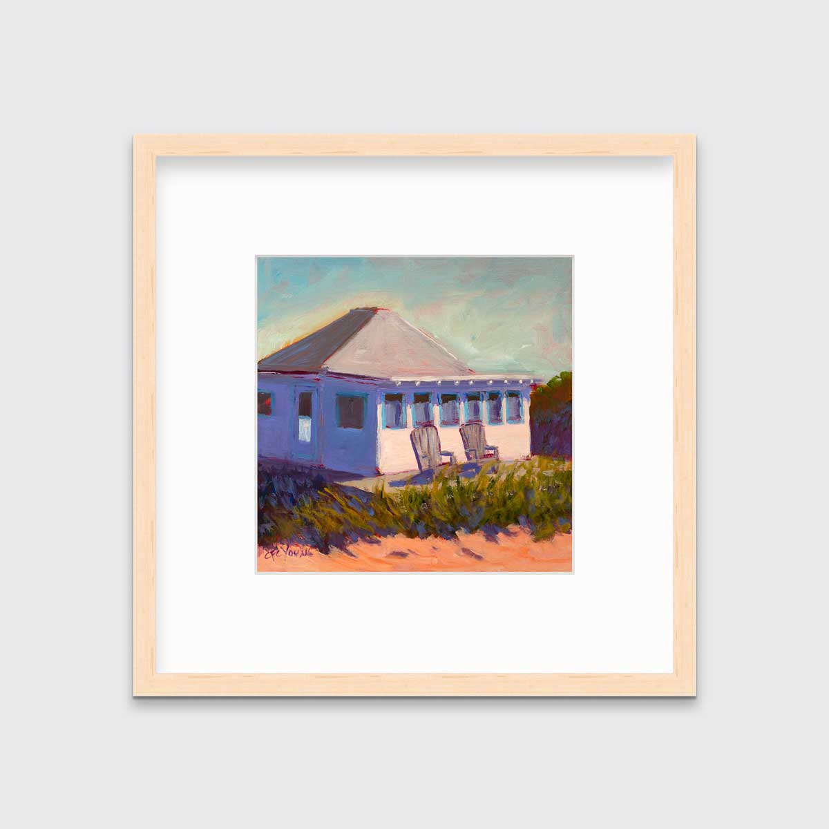 A teal, lavender, beige and green contemporary cottage print with adirondack chairs in a natural wood frame with a mat hangs on a white wall.