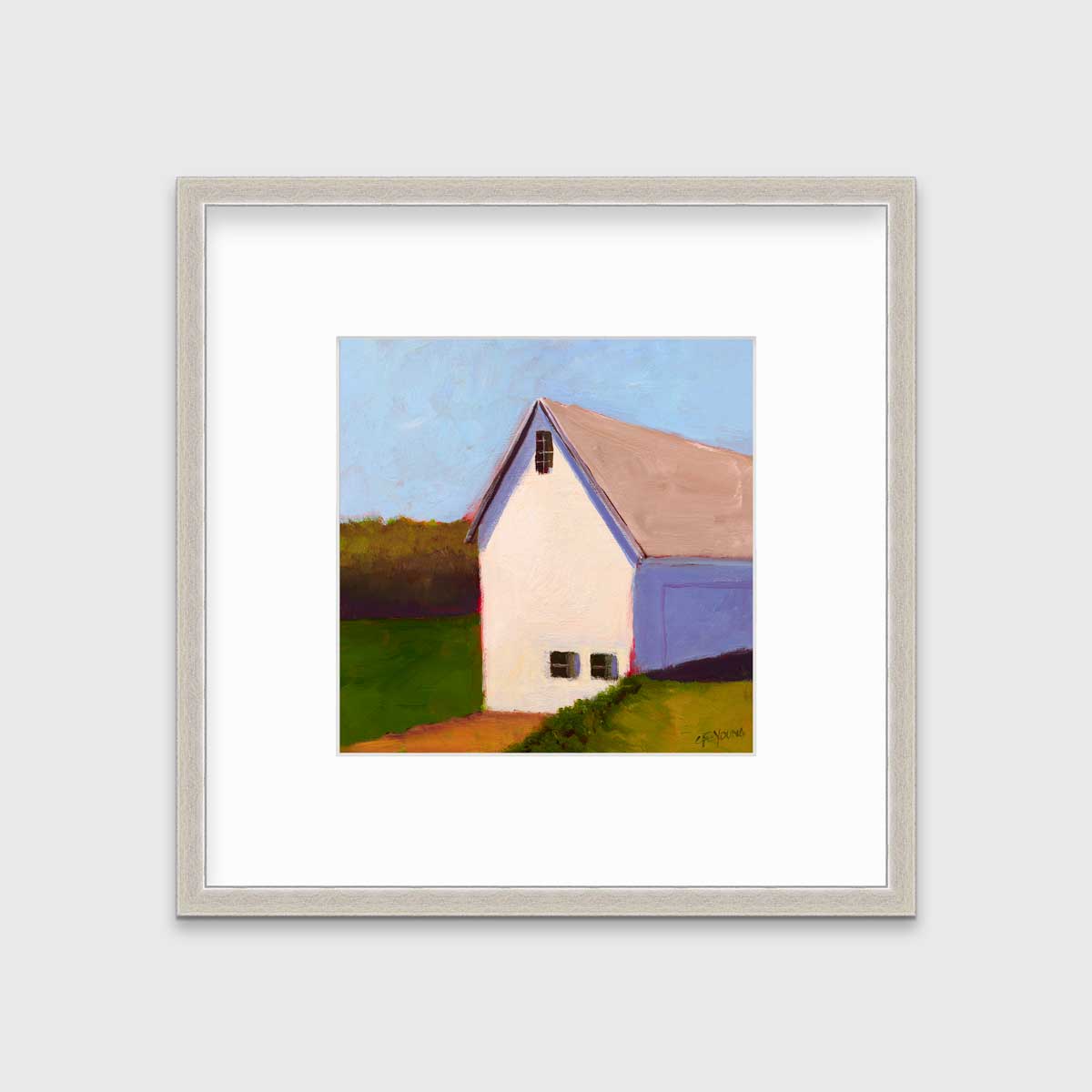A blue, green, white and lavender contemporary barn print in a silver frame with a mat hangs on a white wall.