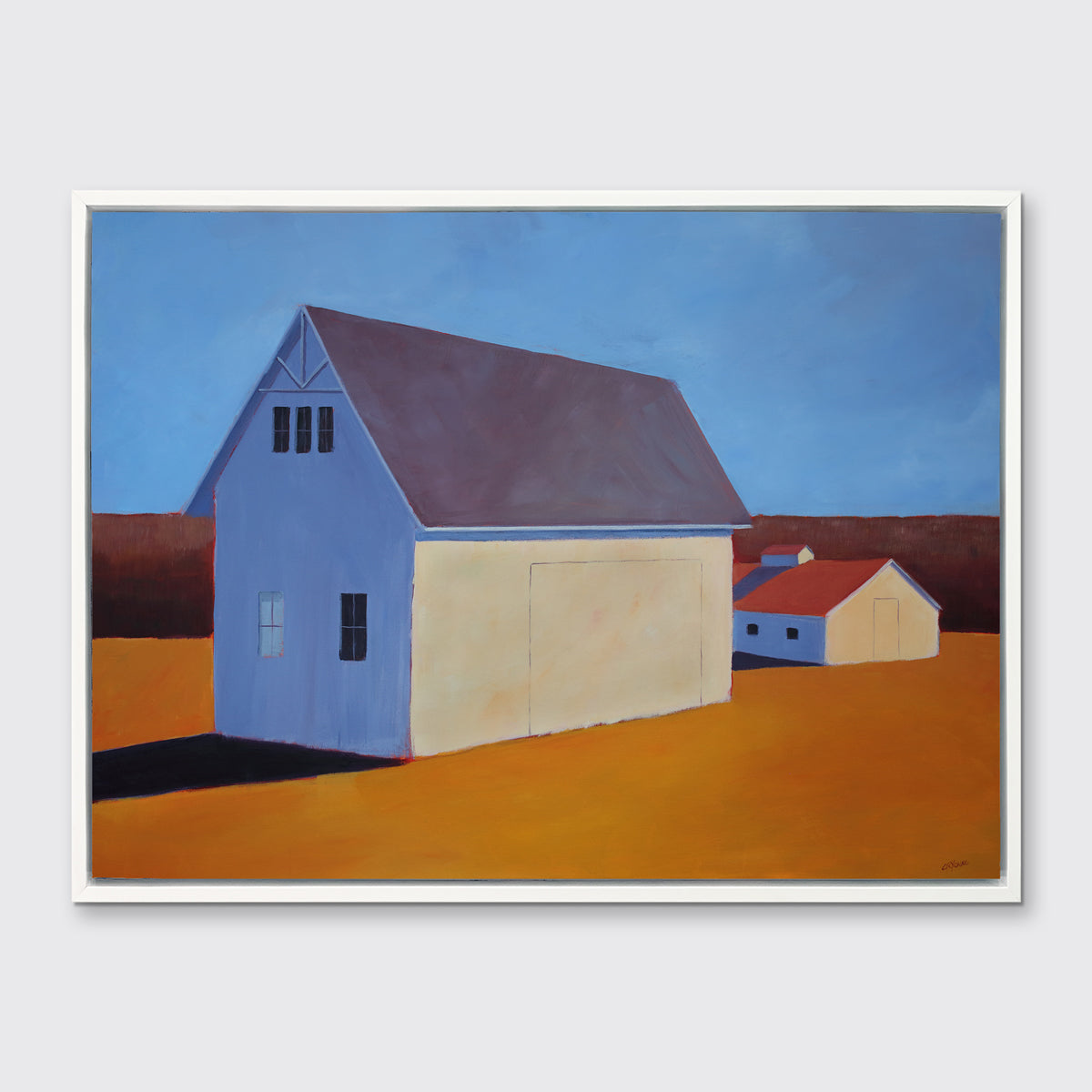 A blue, dark orange, beige and lavender contemporary barn print in a white floater frame hangs on a white wall.