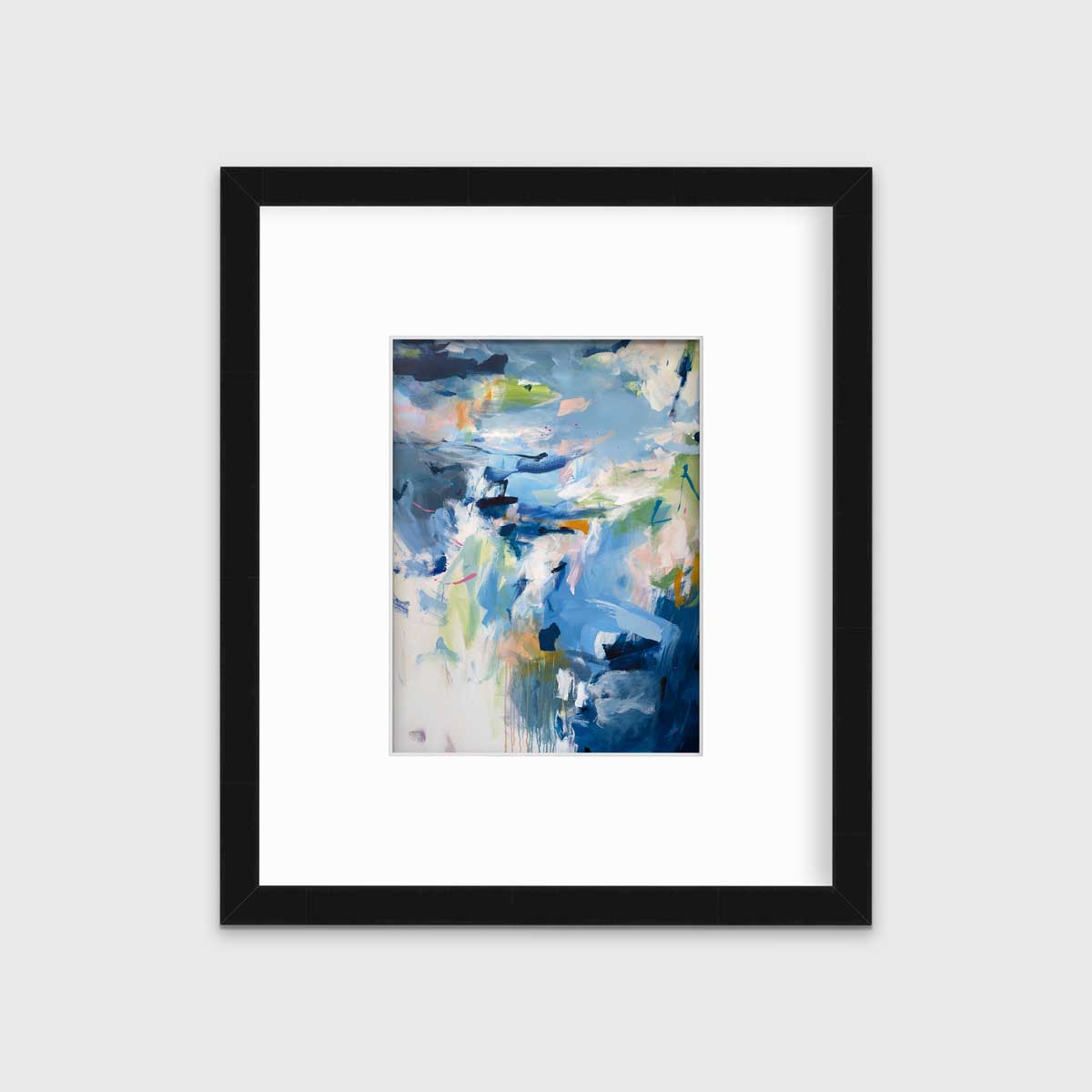A blue abstract print by Kelly Rossetti in a black frame with a mat hangs on a white wall.