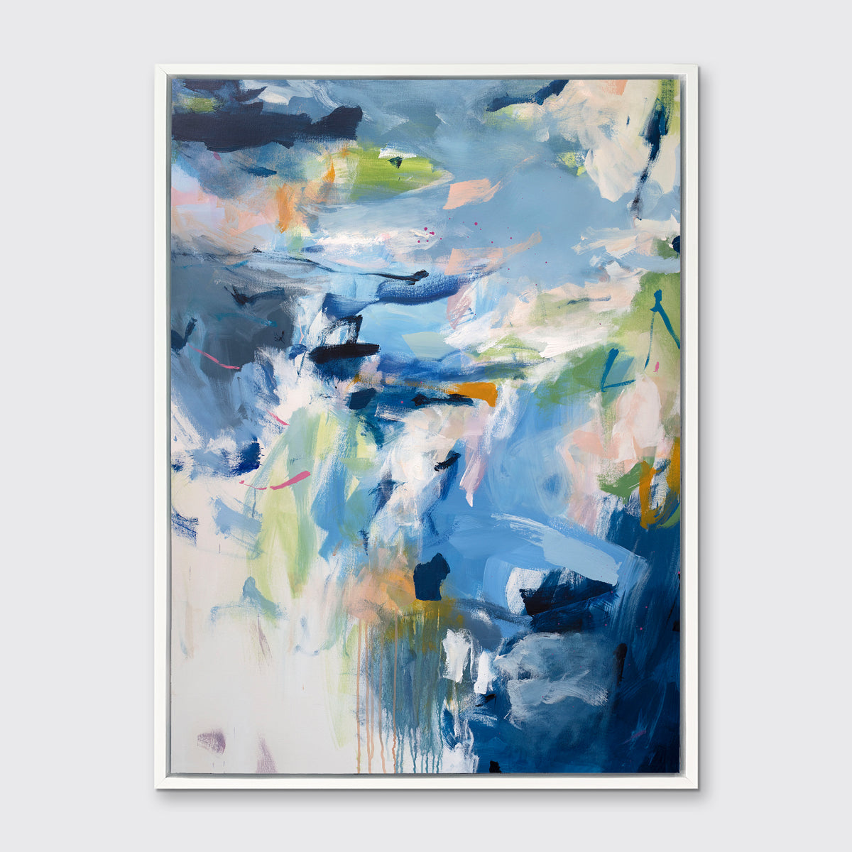 A blue, green and white abstract print by Kelly Rossetti in a white floater frame hangs on a white wall.